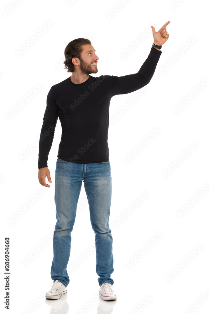 young man pointing at something young man pointing at something