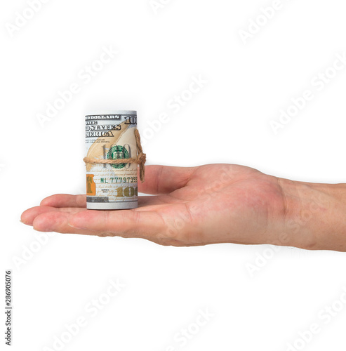 hand holding a roll of 100 usd