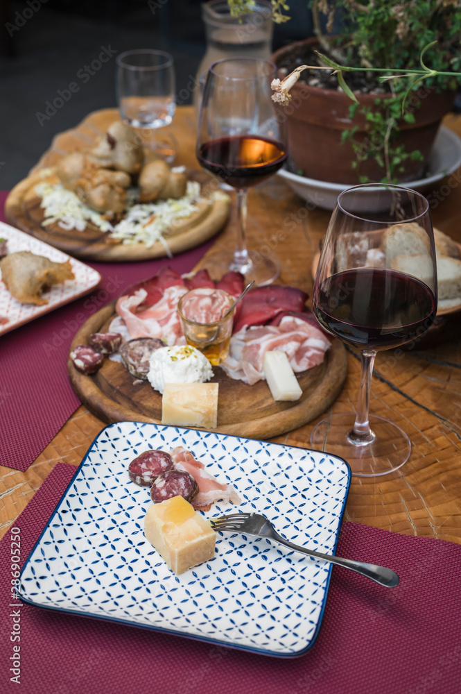 Typical North Italy aperitif with local food