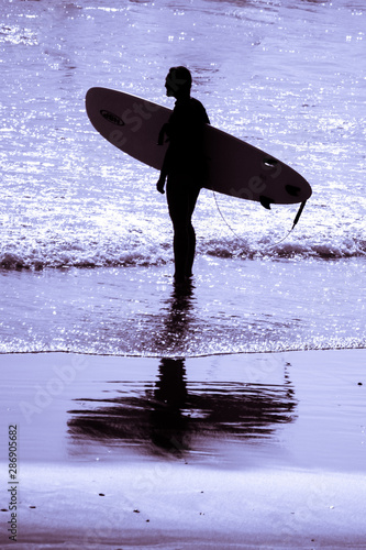 Silhouette of surfers in the shore of taghazout agadir morocco