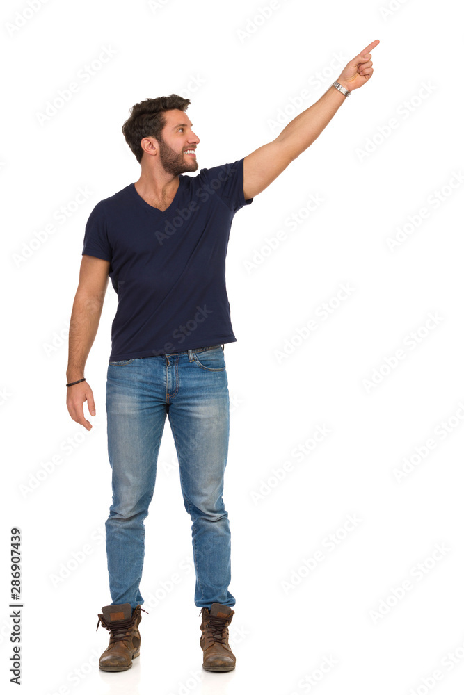 young man pointing at something young man pointing at something