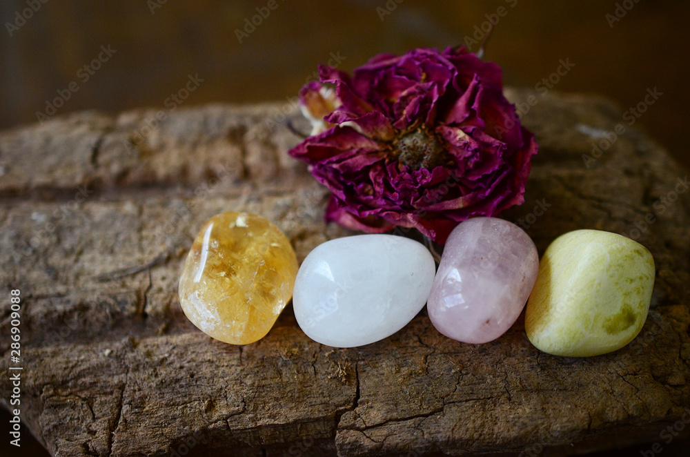 Positivity Crystals, Mindfulness. Tumbled Crystal Bundle: Rose Quartz, Citrine, Serpentine, and Milky Quartz. Energy Spring Cleaning. Variety of healing crystals, pastel colors in natural lighting