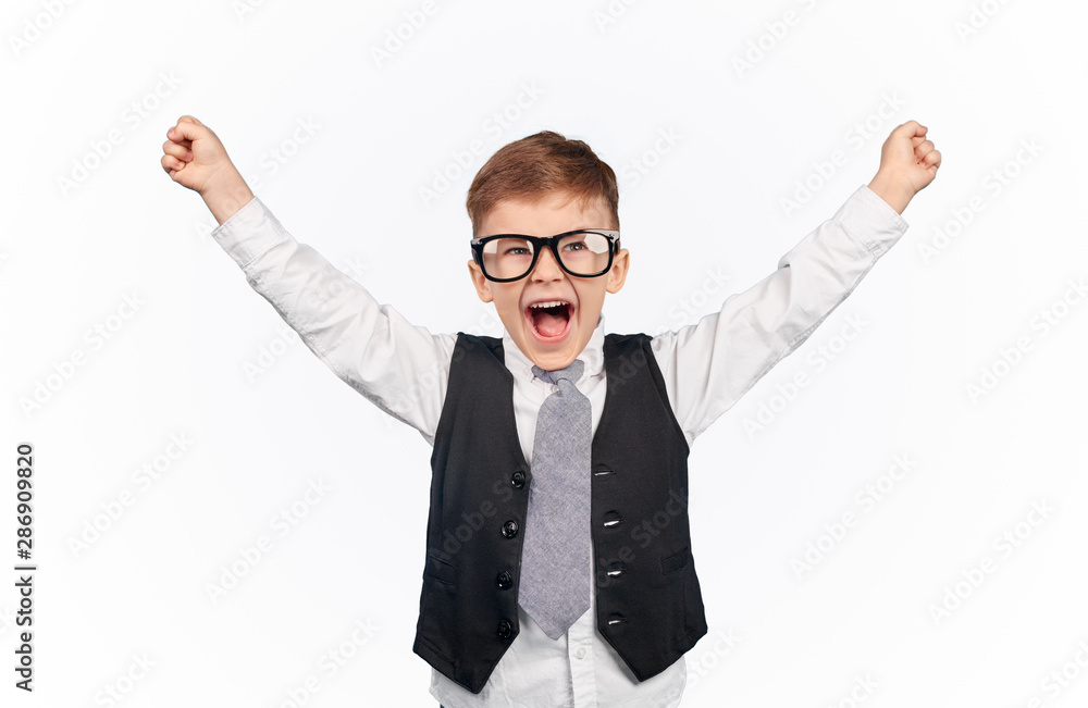 Funny nerdy kid celebrating win with hands up Funny nerdy kid celebrating win with hands up