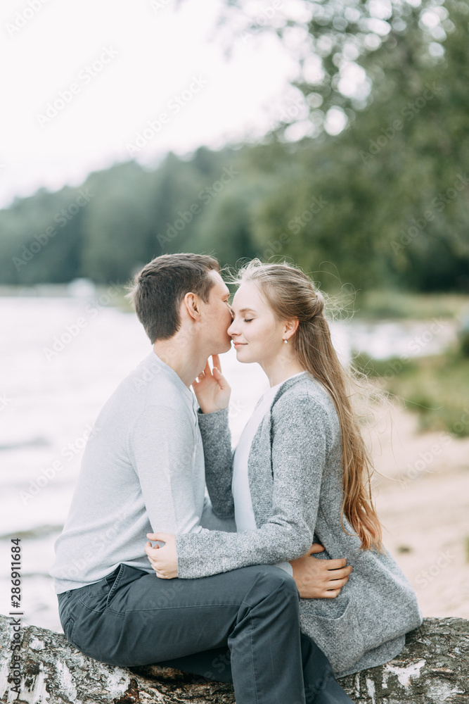 travel walk in the woods. young couple walking on the lake. travel walk in the woods. young couple walking on the lake.