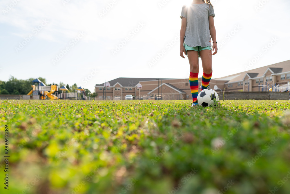 Girl Dribbling Soccer Ball in Field Stock Photo Adobe Stock