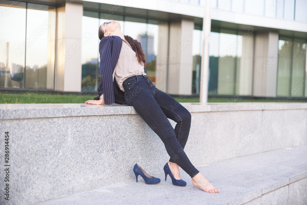 Womаn in high heels having a rest