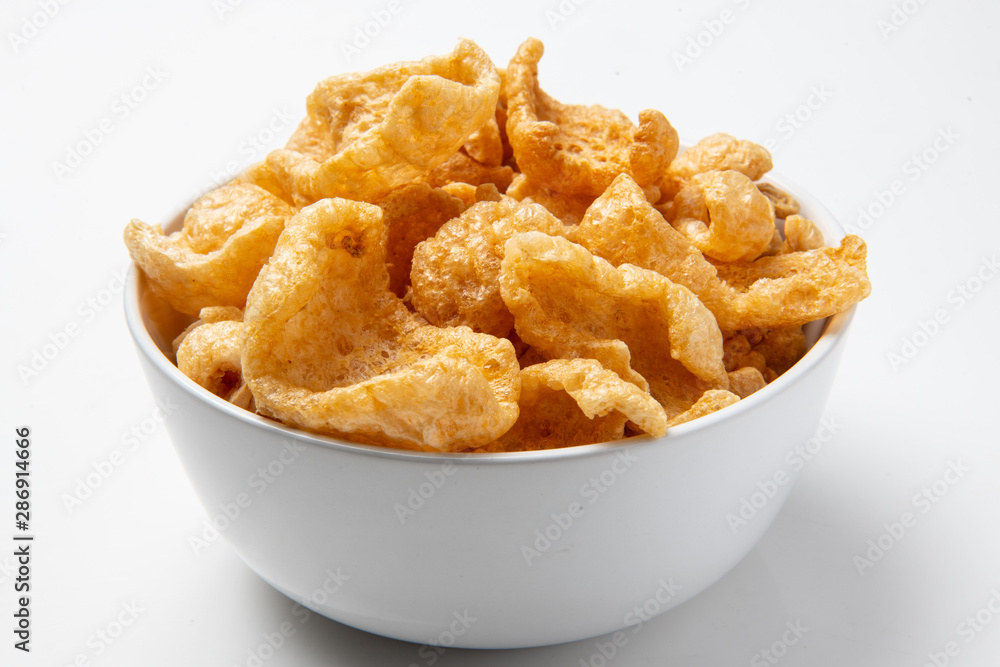 White Bowl of Fried chicharrones (pork rind)