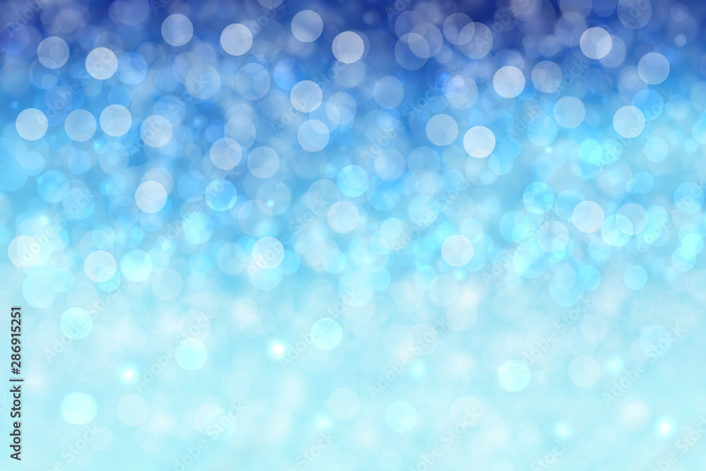 Abstract blurred festive winter christmas or Happy New Year background with shiny blue and white bokeh lighted snow landscape. Space for your design. Card concept. Abstract blurred festive winter christmas or Happy New Year background with shiny blue and white bokeh lighted snow landscape. Space for your design. Card concept.