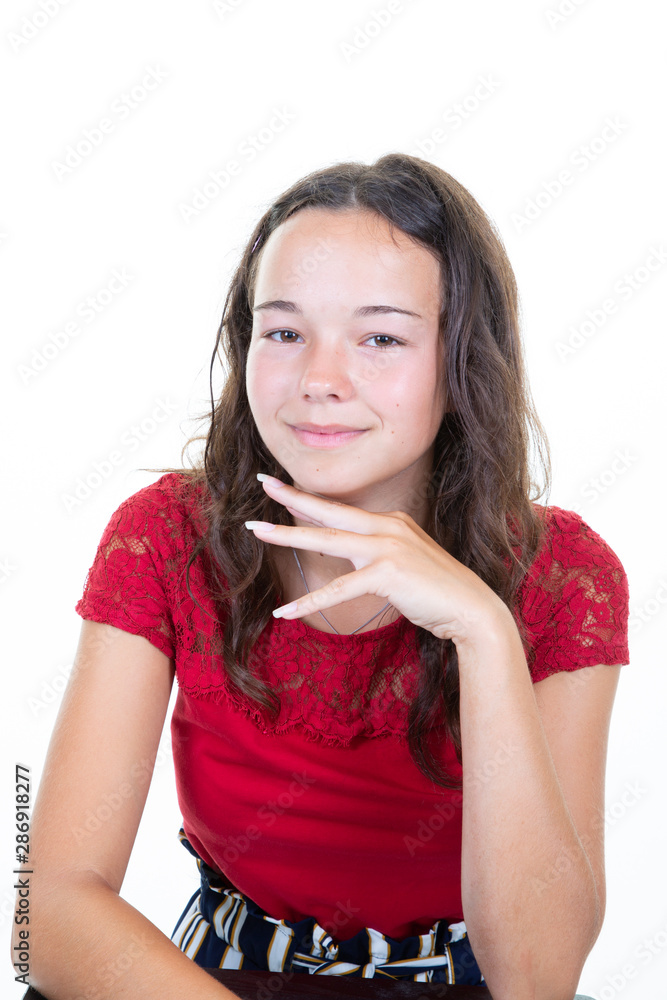 pretty teenager girl brunette hands on chin sit on white background pretty teenager girl brunette hands on chin sit on white background
