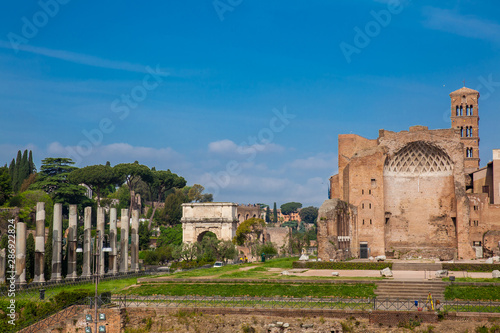Ruins of the Temple of Venus and Roma located on the Velian Hill and Arch of Titus