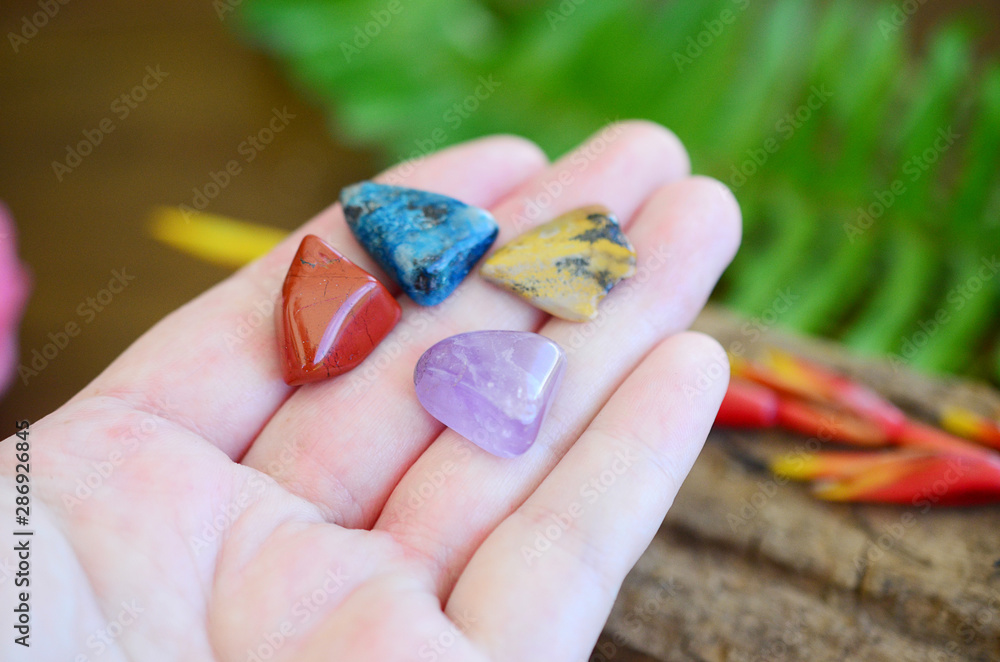 Crystal Medicine Bag; Chrysocolla, Amethyst, Red Jasper, and Ocean Jasper! Small, pocket sized crystal bundle. Great for meditation and reiki energy healing. Yogi crystals in woman's hand. Crystal Medicine Bag; Chrysocolla, Amethyst, Red Jasper, and Ocean Jasper! Small, pocket sized crystal bundle. Great for meditation and reiki energy healing. Yogi crystals in woman's hand.