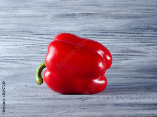 Red Pepper on the wooden background