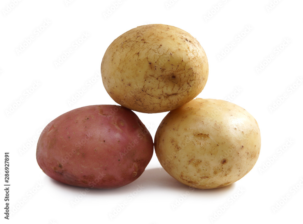 three tubers red white potatoes isolated on white background three tubers red white potatoes isolated on white background