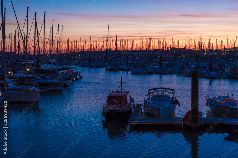 Colorful sunset in the port of Minimes of La Rochelle, France
