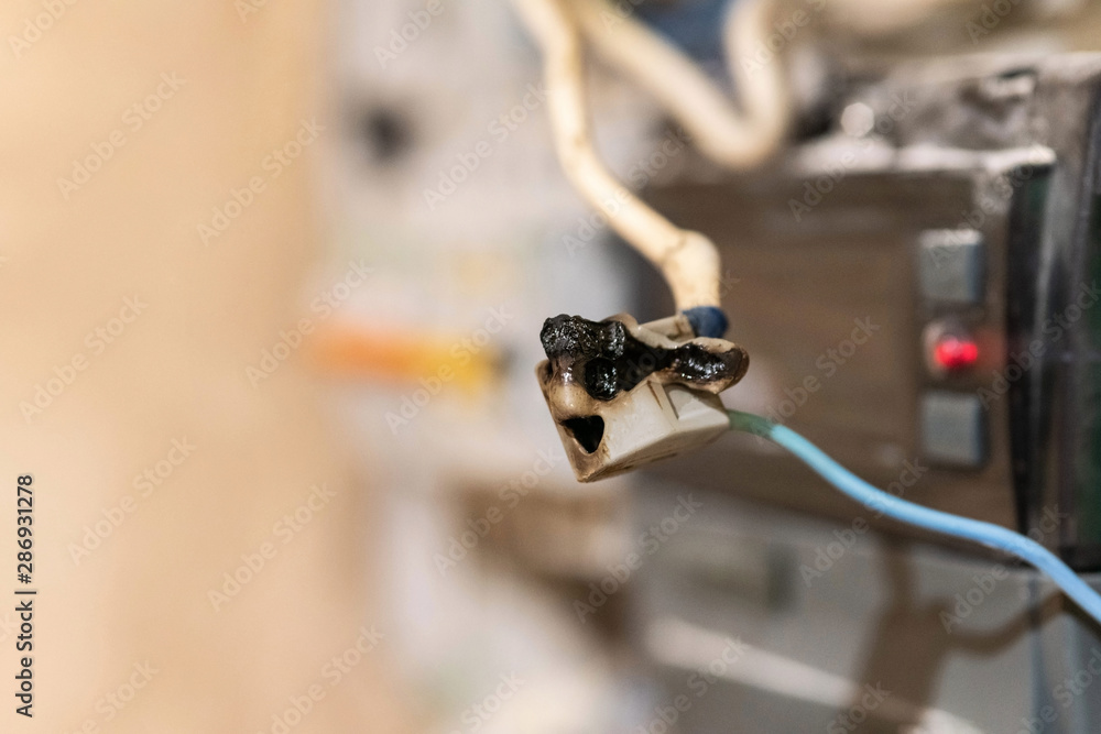 Burned wire, splicing connector, electrical terminal block of