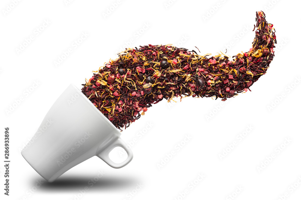 Dry herbal tea pouring into cup isolated on white background. Flat lay. Abstract concept. - obrazy, fototapety, plakaty 