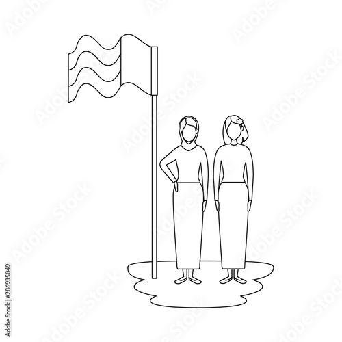 islamic women with traditional burka and arabia flag in pole