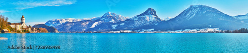 Panorama of Wofgangsee lake and snowy Alps, St Wolfgang, Salzkammergut, Austria photo