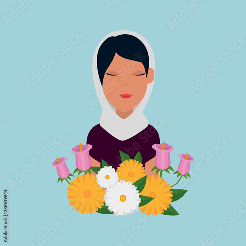 islamic woman with traditional burka and garden flowers