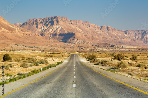 Endless road driving drive travel traveling desert landscape no limit loneliness infinite distance