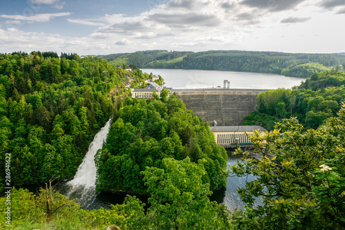 lead hole Dam is a congrete dam across the lead mountains and saale river, overflow, rare event, Saalburg, Thuringia, Germany photo