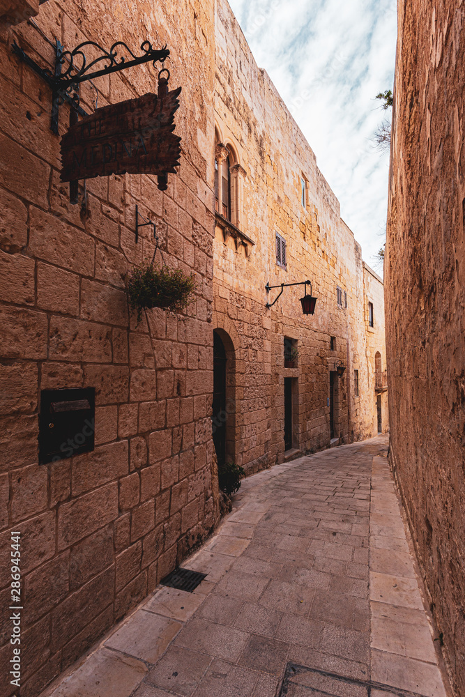 Narrow Alley in Mdina Malta, ancient brick walls
