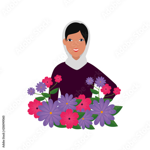 islamic woman with traditional burka and garden flowers