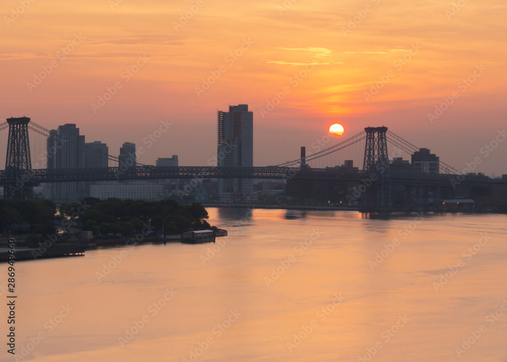 Sunrise at Williamsburg bridge from East River