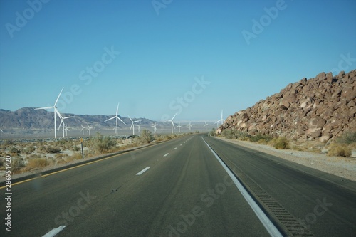 road to nowhere, road, travel, highway, desert, mountain, windmills