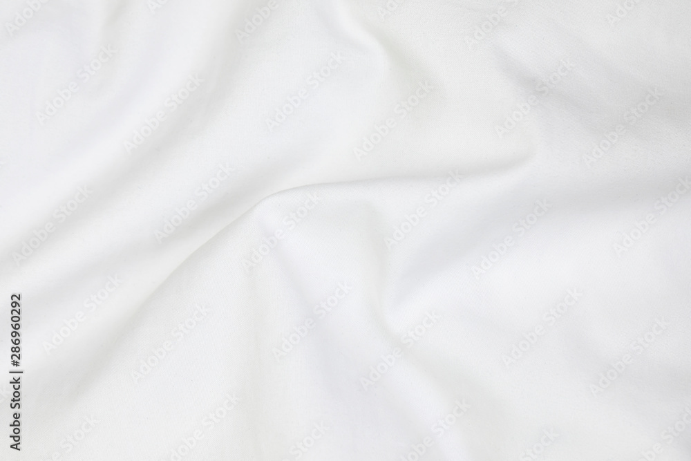 Close up of white bedding sheets soft focus and copy space