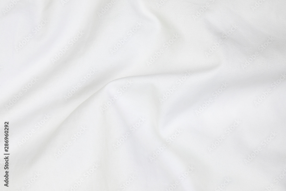 Close up of white bedding sheets soft focus and copy space