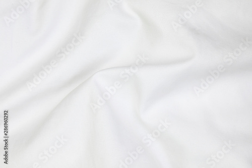 Close up of white bedding sheets soft focus and copy space photo