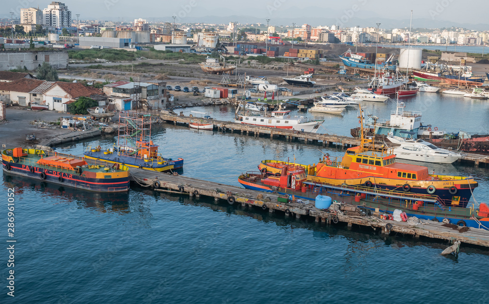 Small boats docked at Durres Port.