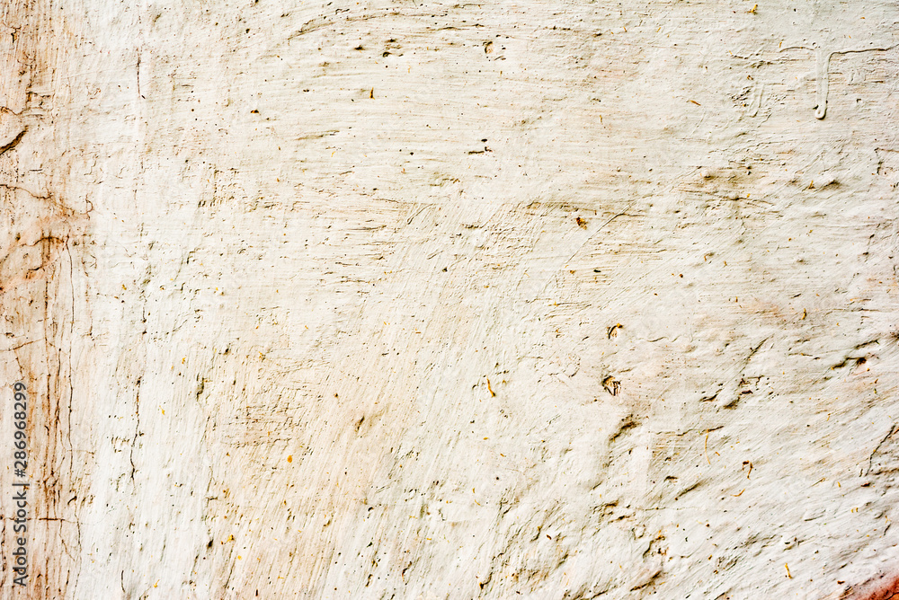 Obraz premium Texture of a concrete wall with cracks and scratches which can be used as a background