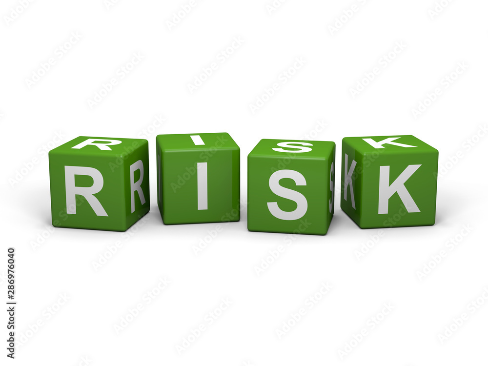 The word RISK out of green letter dices The word RISK out of green letter dices