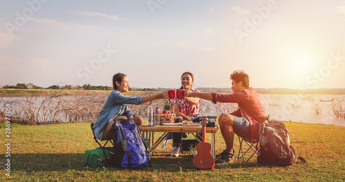 Photography A group of Asian friends drinking coffee and spending time making a picnic in the summer holidays