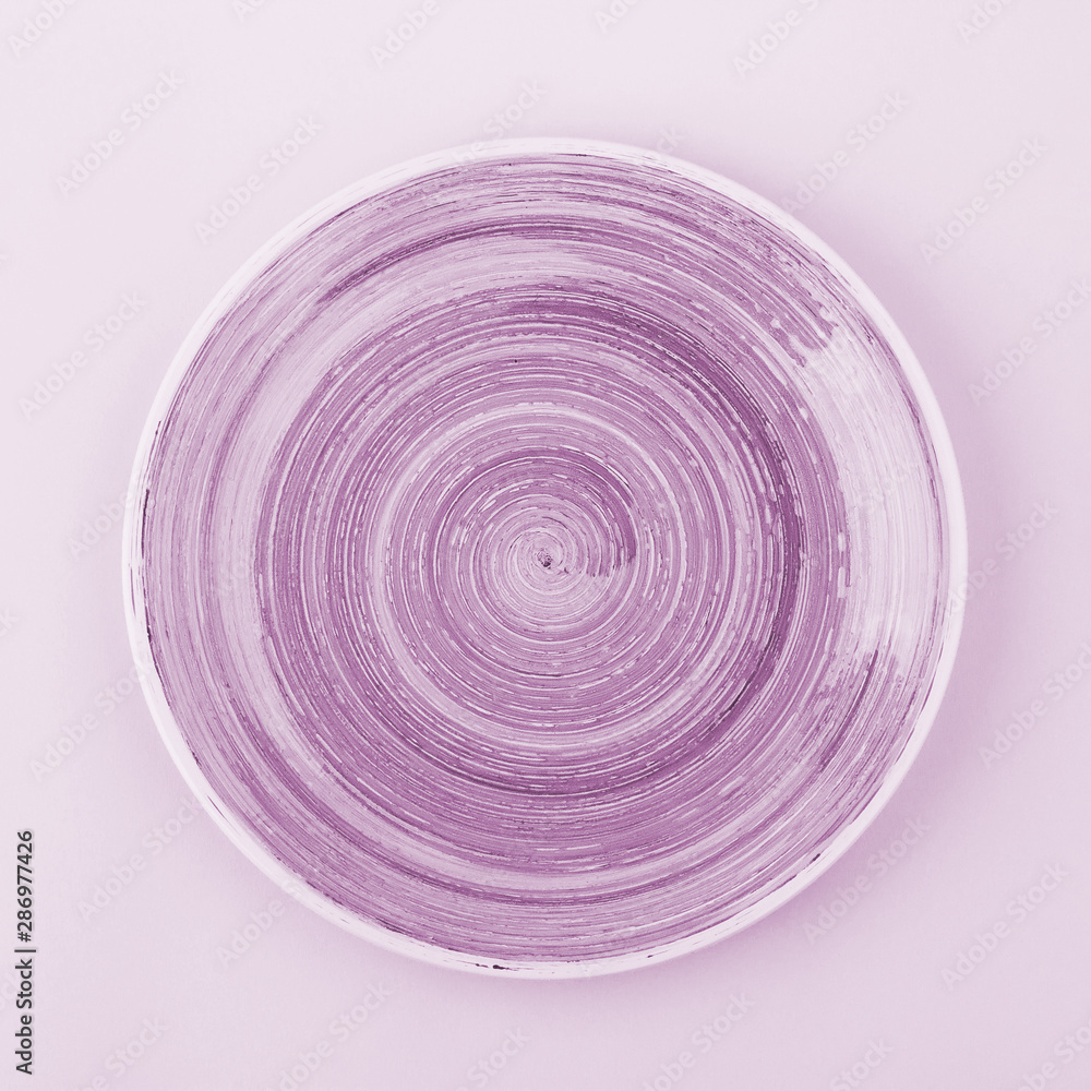 Violet color plate on the light background Violet color plate on the light background