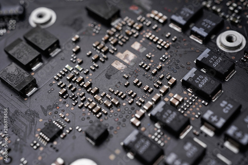 A black colour waterproof Printed Circuit Board with CPU, SMD & IC mounted part on board