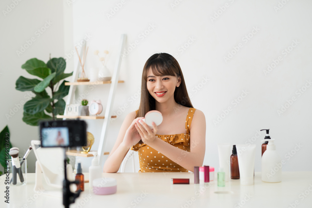 Asian beauty blogger recording video at home Asian beauty blogger recording video at home