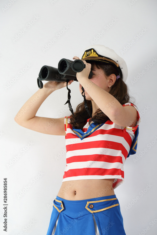beautiful girl in a sailor suit on a white background beautiful girl in a sailor suit on a white background