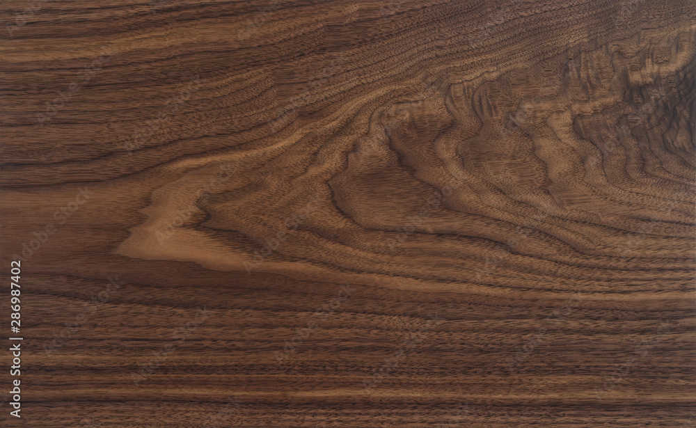 Fototapeta premium Texture of black walnut board with oil finish
