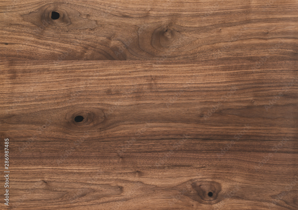 Texture of black walnut surface with oil finish Texture of black walnut surface with oil finish