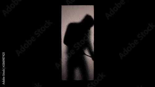 Silhouette of bandit cracking door lock, attack on private property, burglary