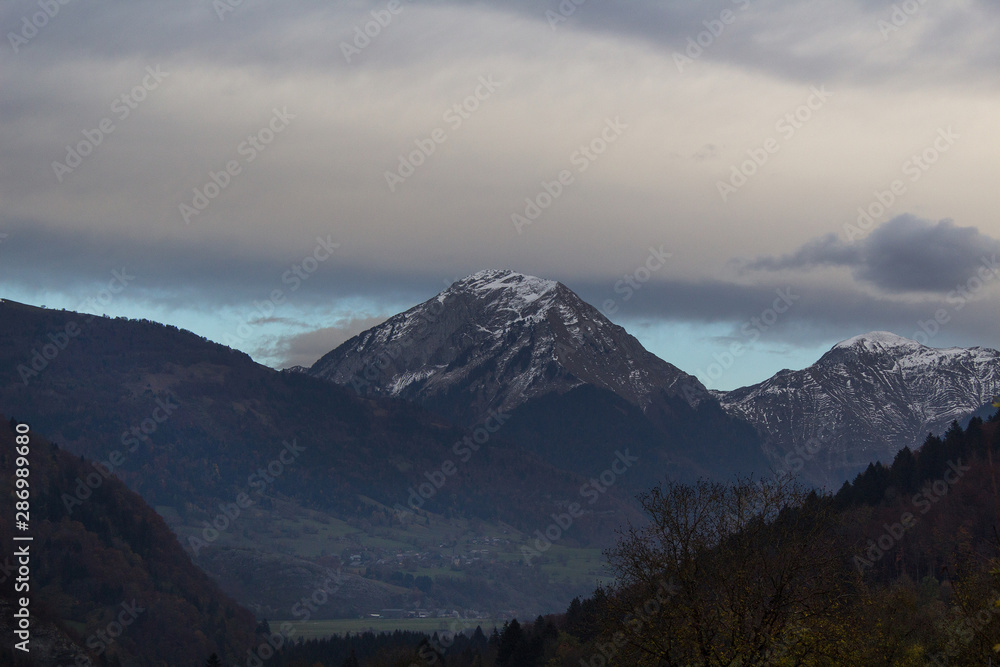 panoramic view of the alps mountains with snow peak 