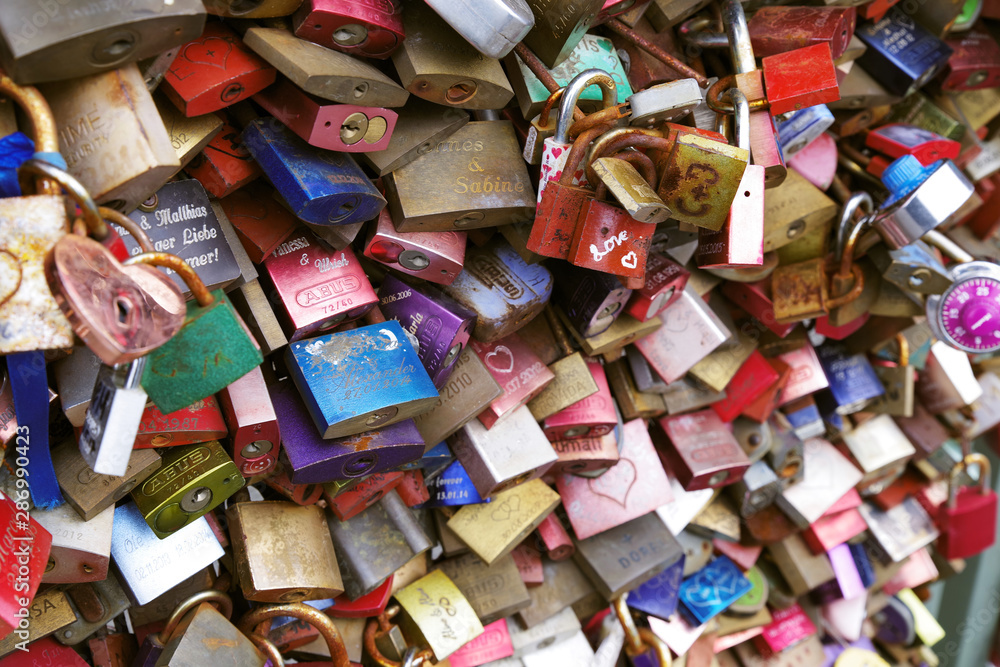 Colorful metal pad locks, symbol of eternal love. Colorful metal pad locks, symbol of eternal love.