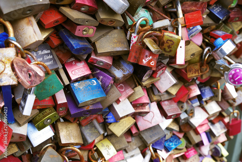 Colorful metal pad locks, symbol of eternal love. © EverGrump