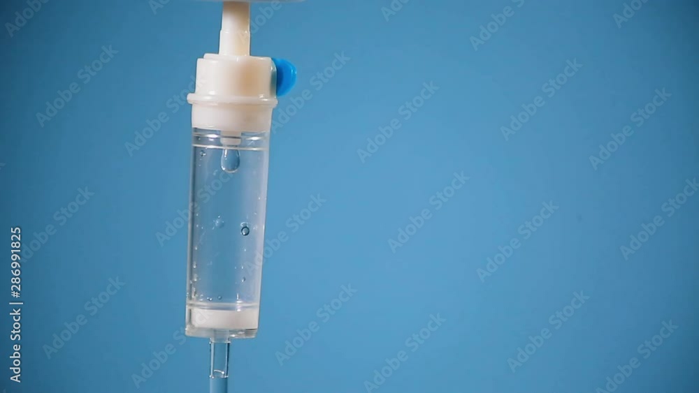 Close up to hospital drop counter on blue background Close up to hospital drop counter on blue background