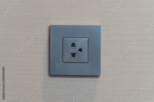 electric plug gray color with copy space