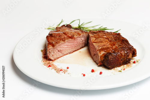 beef rib eye on a white plate