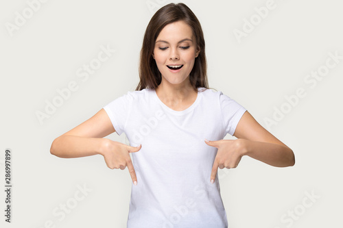 Wallpaper Mural Happy millennial girl look down point at sale offer Torontodigital.ca